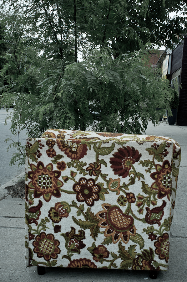 floral chair on sidewalk