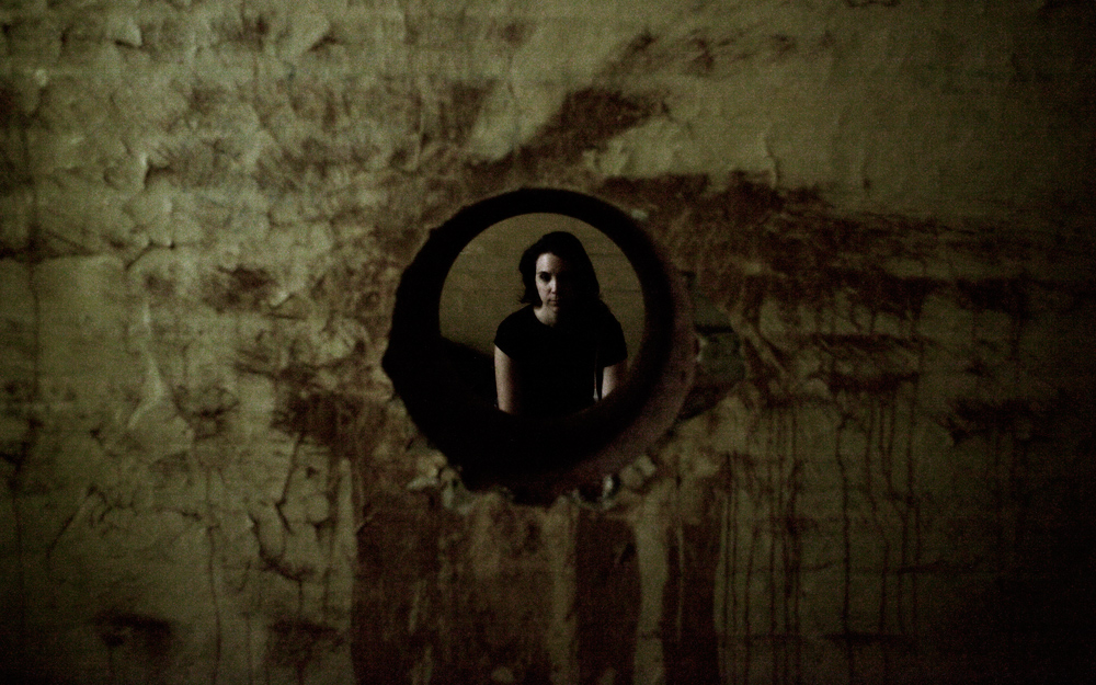 adriana behind the baby hole